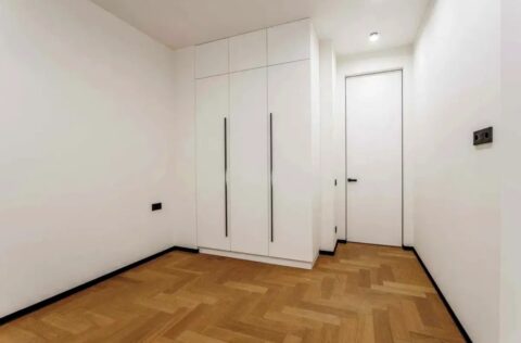 Cozy furnished bedroom with contemporary interior in apartment for sale in Kyiv, Bulvarno-Kudriavska Street 17A, Shevchenkivskyi District, new modern building