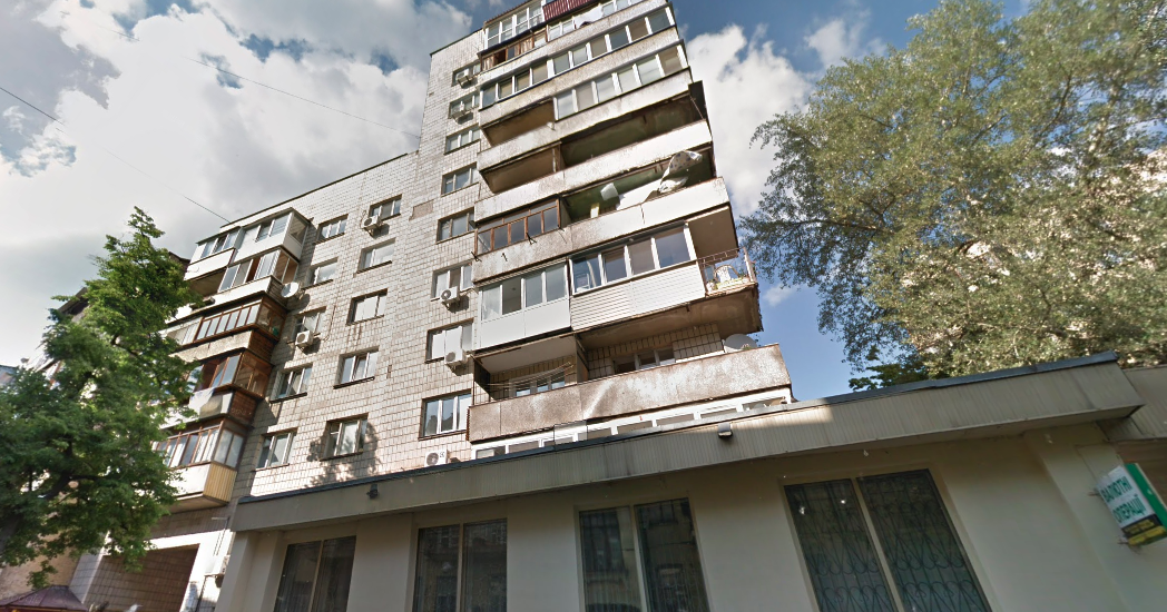 Brick building facade apartment for sale in Kyiv Chekhovskyi Lane 2 Shevchenkivskyi district exterior view