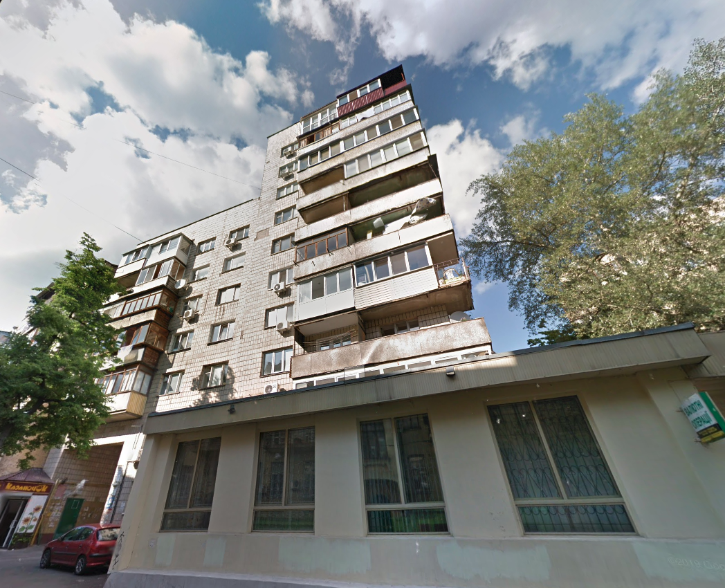 Brick building facade apartment for sale in Kyiv Chekhovskyi Lane 2 Shevchenkivskyi district exterior view