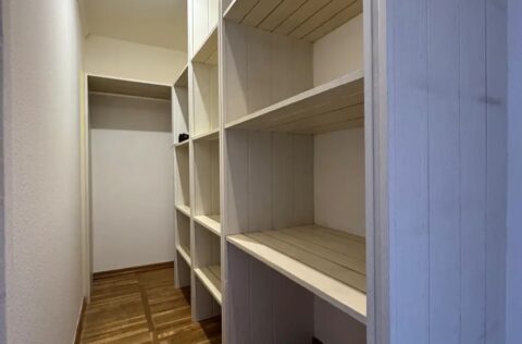 Walk-in wardrobe in luxury duplex apartment on Yevhena Chykalenka 20 Kyiv for sale