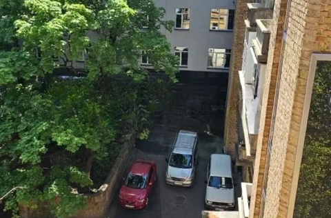 Quiet courtyard view from apartment for sale in Kyiv Pyrohova St 5 city centre