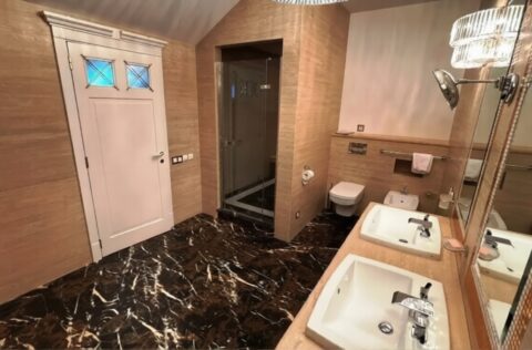 luxury master bathroom with bathtub and rain shower in apartment for sale in Kyiv, Volodymyrska St 20/1-A Shevchenkivskyi district;