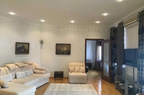 Spacious luxury living room in apartment for sale in Kyiv, Yevhena Chykalenka St., 25, Shevchenkivskyi district with panoramic windows and designer interior