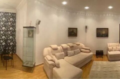 Spacious luxury living room in apartment for sale in Kyiv, Yevhena Chykalenka St., 25, Shevchenkivskyi district with panoramic windows and designer interior