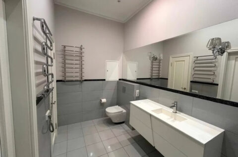 Modern bathroom with shower cabin in renovated Kyiv apartment for sale in Kyiv, Sichovykh Striltsiv 10 Lvivska Square