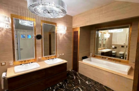 luxury master bathroom with bathtub and rain shower in apartment for sale in Kyiv, Volodymyrska St 20/1-A Shevchenkivskyi district;