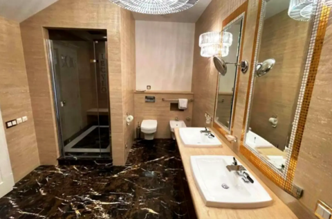luxury master bathroom with bathtub and rain shower in apartment for sale in Kyiv, Volodymyrska St 20/1-A Shevchenkivskyi district;