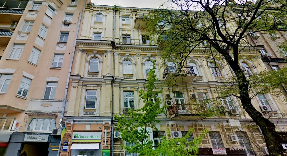 Historic pre-revolutionary building facade on Yevhena Chykalenka St., 25 in Kyiv Shevchenkivskyi district
