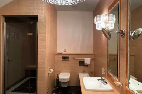 luxury master bathroom with bathtub and rain shower in apartment for sale in Kyiv, Volodymyrska St 20/1-A Shevchenkivskyi district;