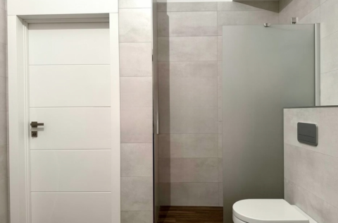 Bathroom in apartment for sale in Kyiv, Reitarska St 28, modern design with bathtub and shower