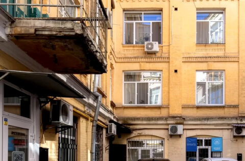 building facade apartment for sale in Kyiv Mykhailivskyi Lane 7 brick residential building 1966 historic centre Kyiv