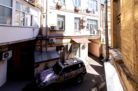 building facade apartment for sale in Kyiv Mykhailivskyi Lane 7 brick residential building 1966 historic centre Kyiv