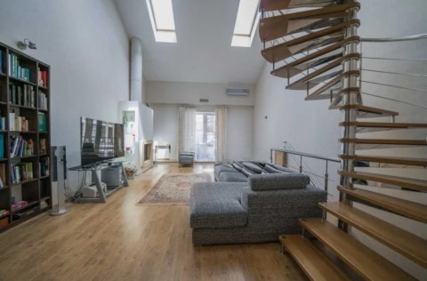 living room with staircase apartment for sale in Kyiv Rylskyi Lane 3 Shevchenkivskyi district penthouse 9m ceilings fireplace