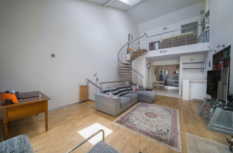 living room with staircase apartment for sale in Kyiv Rylskyi Lane 3 Shevchenkivskyi district penthouse 9m ceilings fireplace