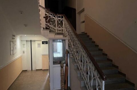 entrance building apartment for sale Kyiv Tarasivska 6A renovated staircase concierge historic building