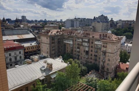 Apartment for sale in Kyiv, Lypky district, Pechersk — panoramic city view from windows of Kapitoliy Residence on Khreshchatyk 27B, overlooking central Kyiv skyline.