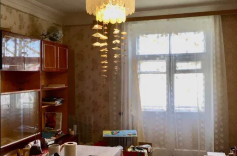 Living room in a Stalinka apartment in Kyiv Centre with a view of Sofia Cathedral