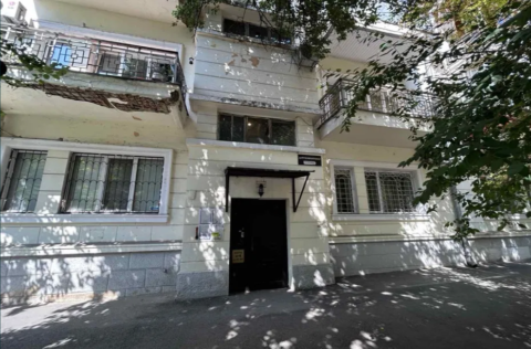 Historic architectural entrance of stalinka building in Kyiv Lypky district, Kruhlouniversytetska St 2/1