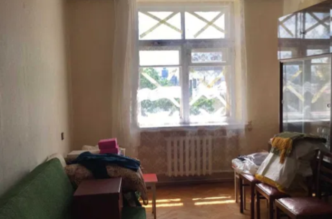 Bedroom in a Stalinka apartment in Kyiv Centre with a view of Sofia Cathedral