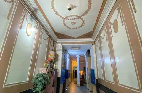Pre-revolutionary elite building entrance on Tarasivska St 8, Kyiv for apartment sale