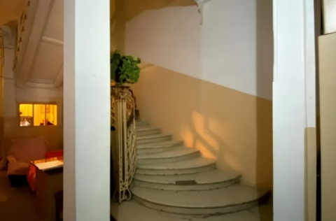 Pre-revolutionary elite building entrance on Tarasivska St 8, Kyiv for apartment sale