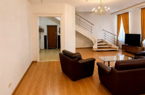 Living room in a renovated duplex apartment on Tarasa Shevchenka Lane, Kyiv