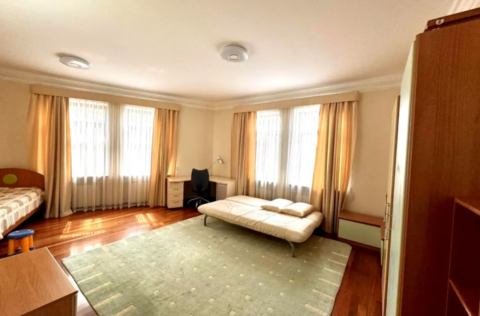 Bedroom in a renovated apartment on Observatorna Street 10, Kyiv