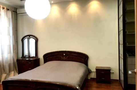 Bedroom in a stalinka apartment on Tarasivska Street 7, Kyiv