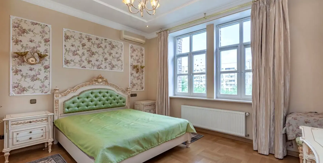 Bedroom in a renovated apartment on Olesia Honchara Street 26, Kyiv