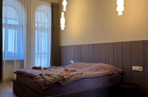 Bedroom in a pre-revolutionary apartment on Kruhlouniversytetska Street 14, Kyiv