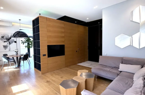 Open space kitchen-living room in a designer apartment on Liuteranska Street 7/10, Kyiv