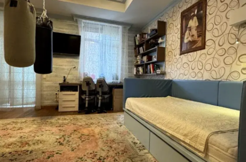 Bedroom in a renovated apartment on Yevhena Chykalenka Street, Kyiv
