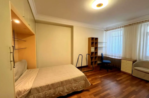 Bedroom in a renovated apartment on Observatorna Street 10, Kyiv