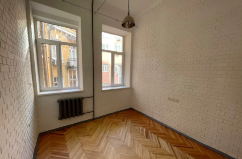 Bedroom in a renovated apartment on Kostelna Street 5, Kyiv