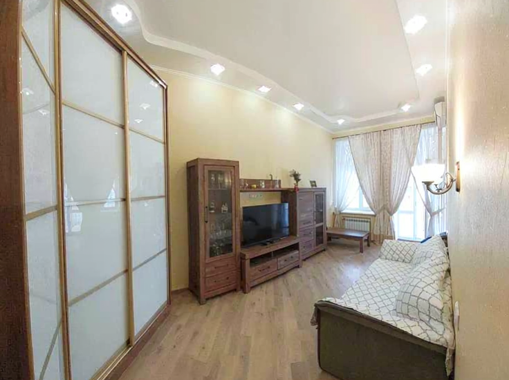 Living room in a renovated apartment on Mykhailivska Street 22b, Kyiv
